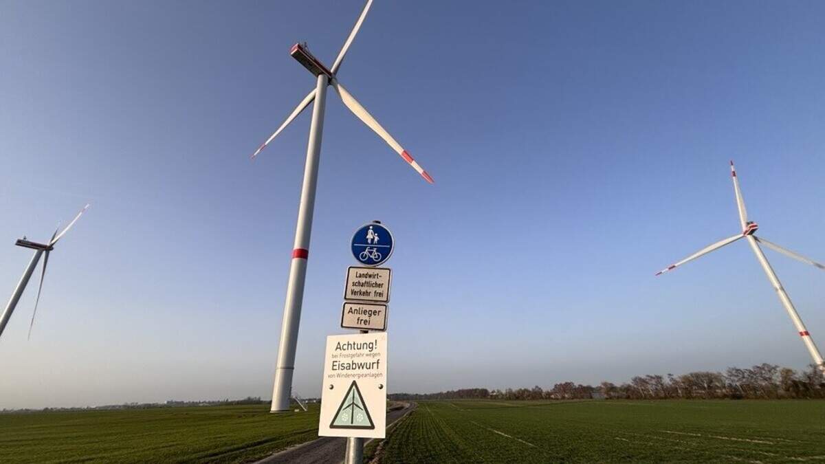 New wind turbine with a warning sign on the premium cycle path - | how ...