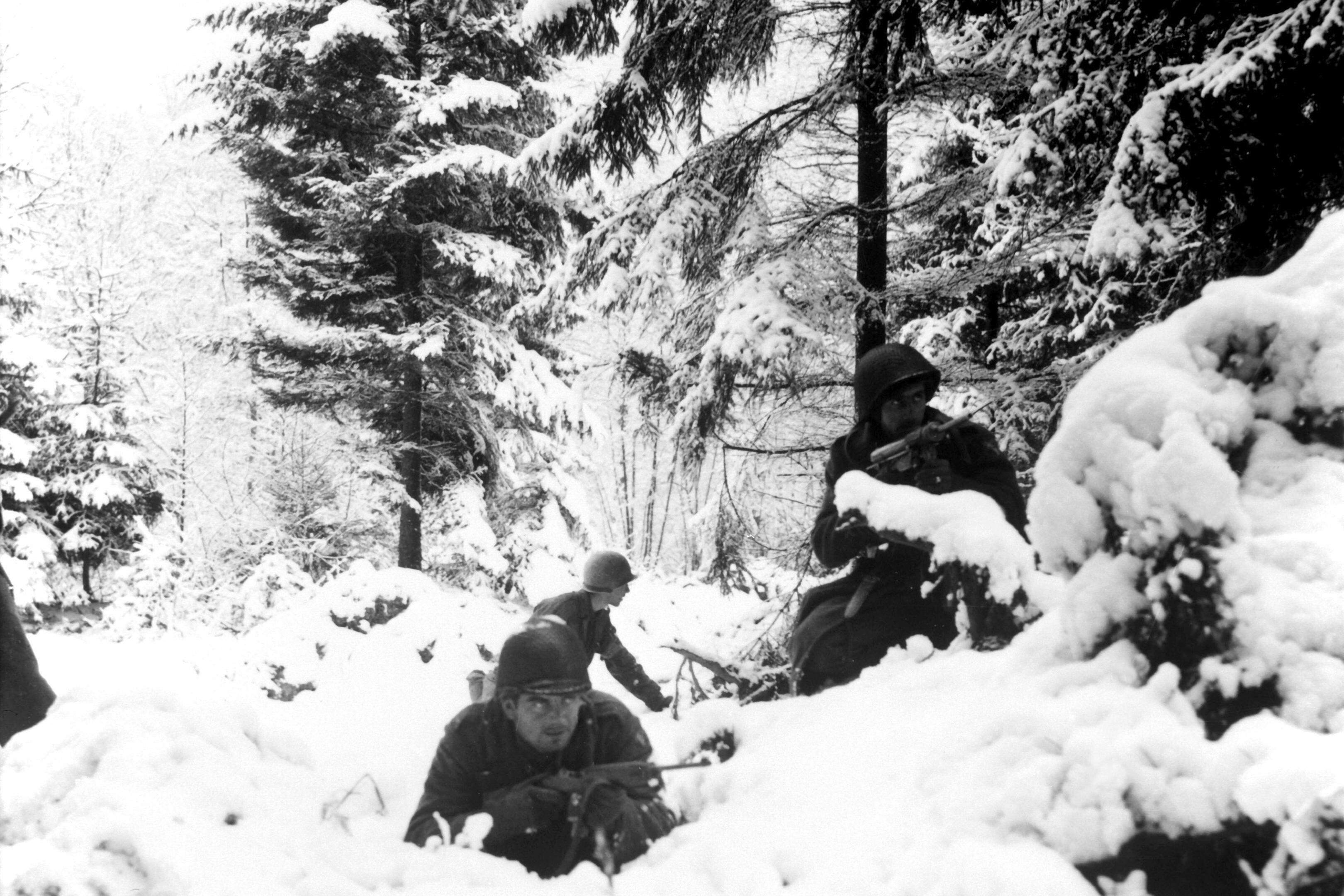 American infantrymen of the 290th Regiment fight in fresh snowfall near Amonines, Belgium.  January 4, 1945.  Braun.  (Army)
NARA FILE #:  111-SC-198534
WAR & CONFLICT BOOK #:  1077